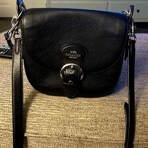 Coach Handbag / Crossbody/ in good condition.Does have a few ink spots inside